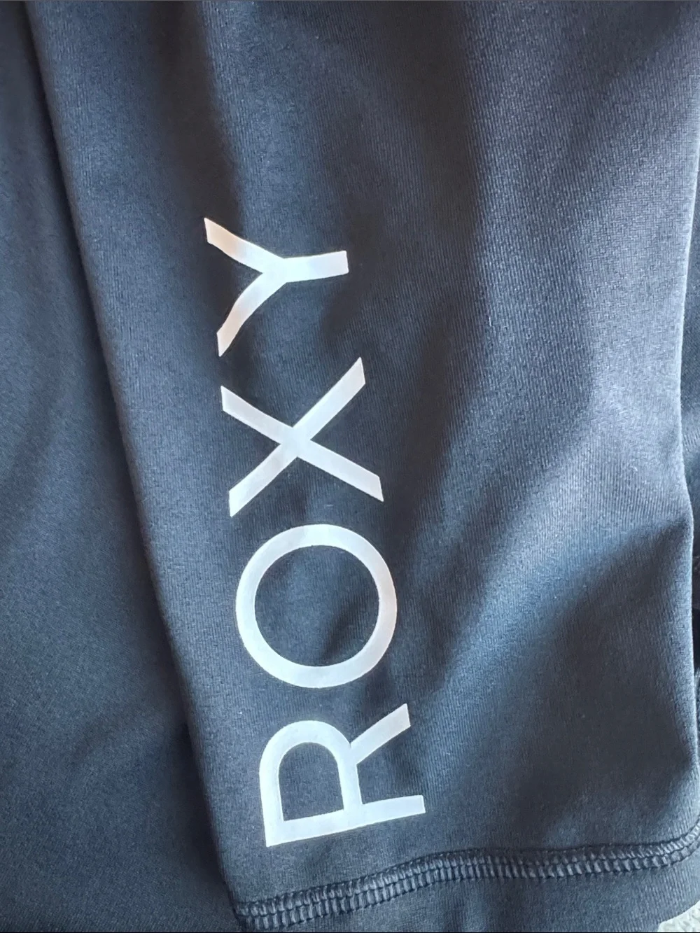 Roxy Black Short Sleeve Swim Top with White Logo